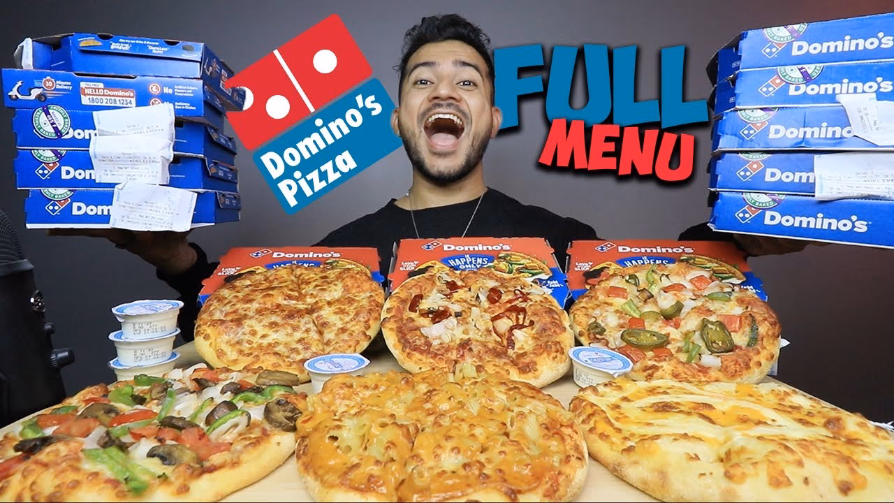 How much does a domino's chicken Dominator pizza cost in India?