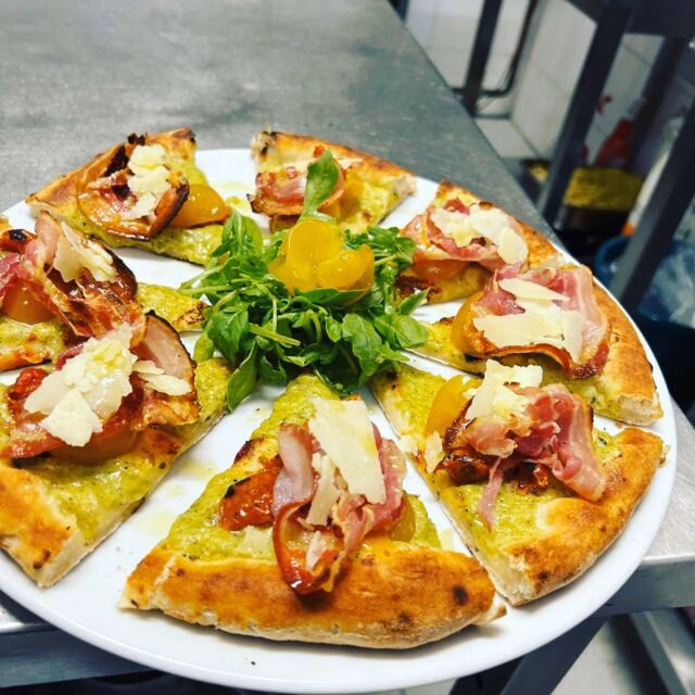 Wie weit ist Pizza Presto von Freilassing entfernt?