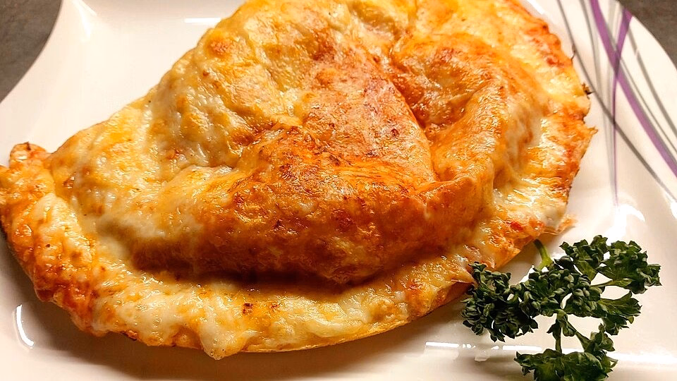 Wie füllt man eine pizzatasche?