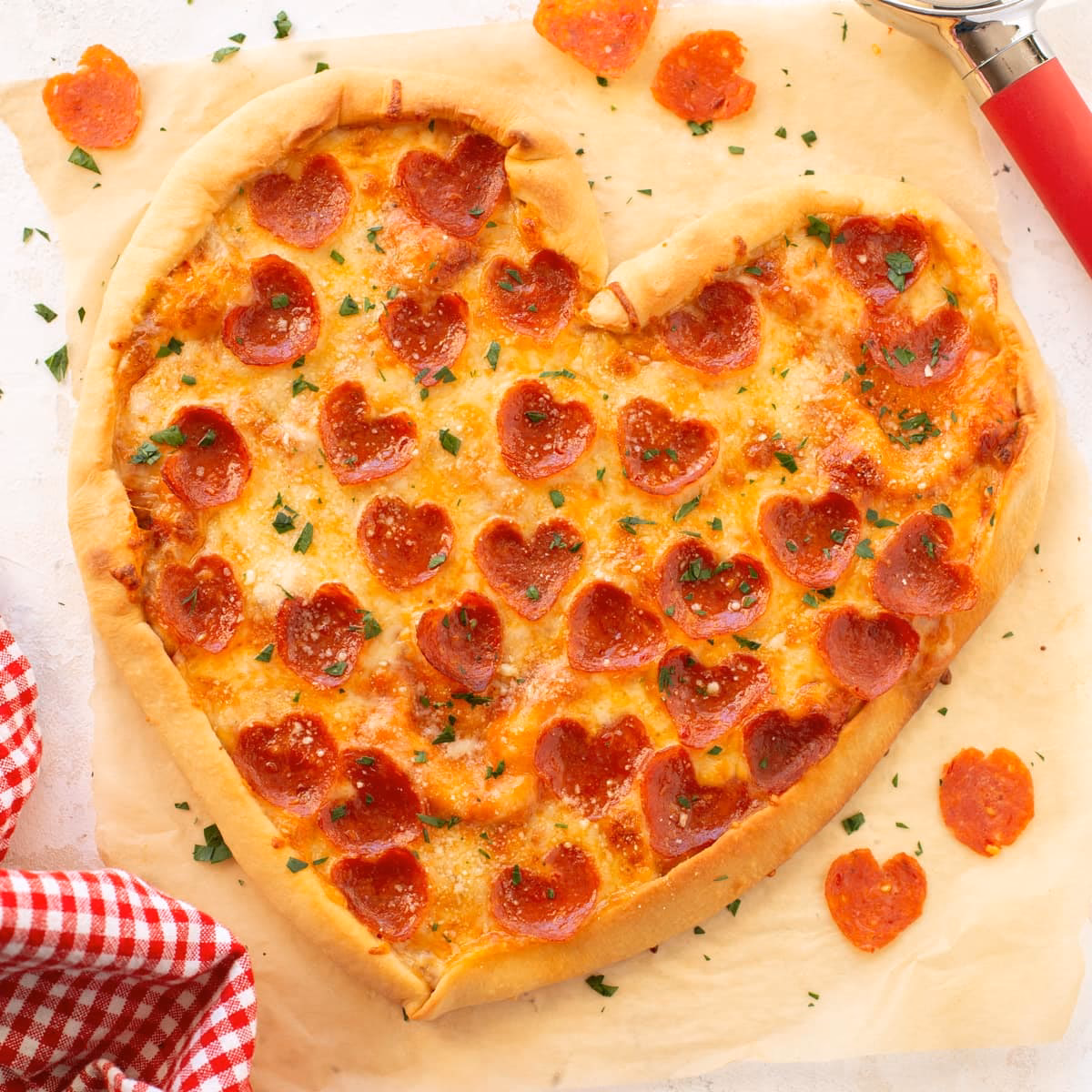 How do you serve a heart shaped pizza?
