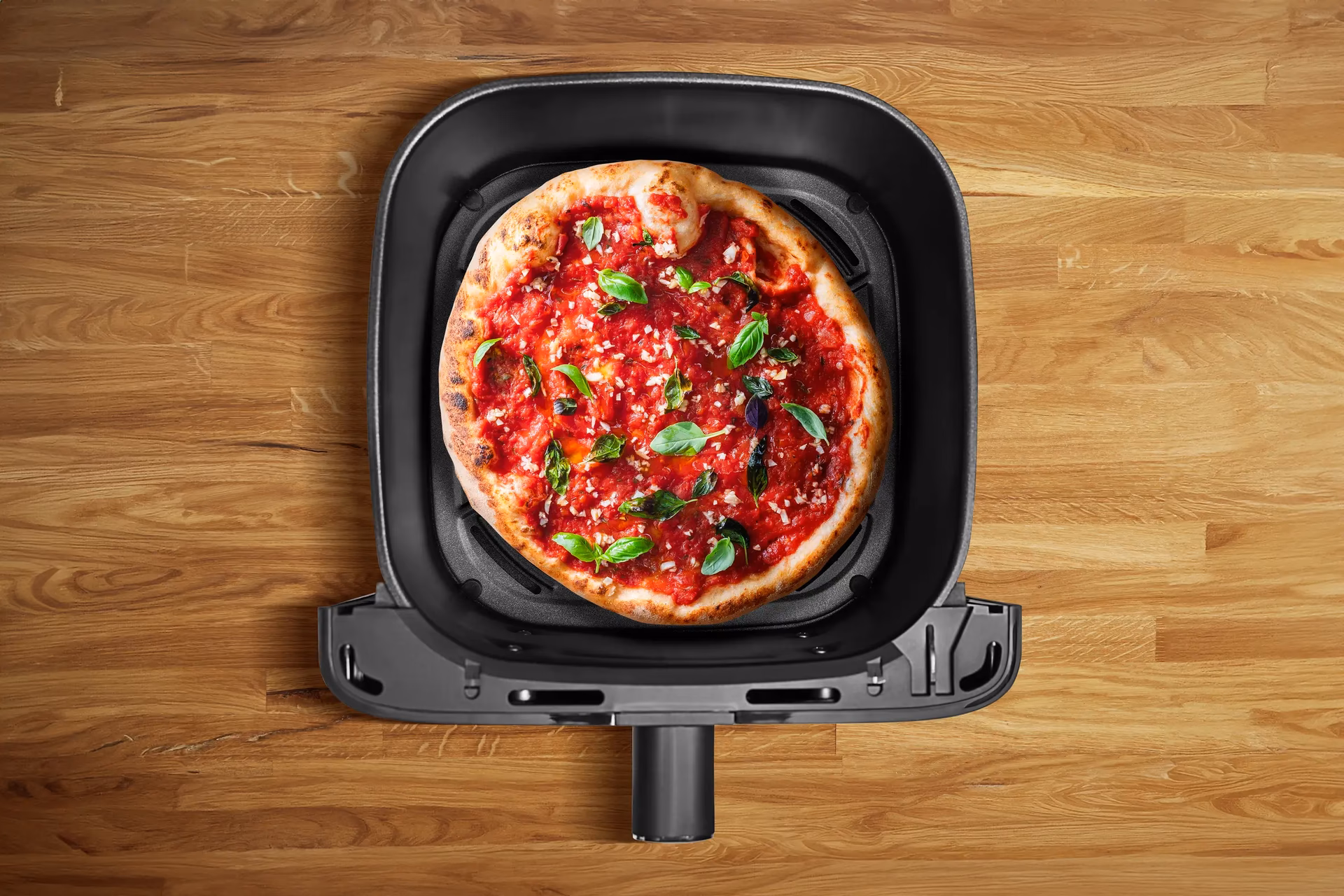 Kann man Pizza in der Heißluftfritteuse Backen?