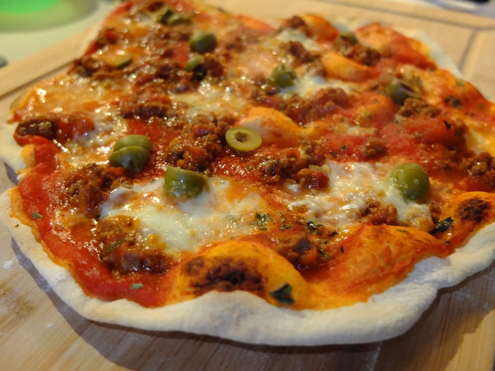 Wie lange dauert es bis Pizza gebacken wird?