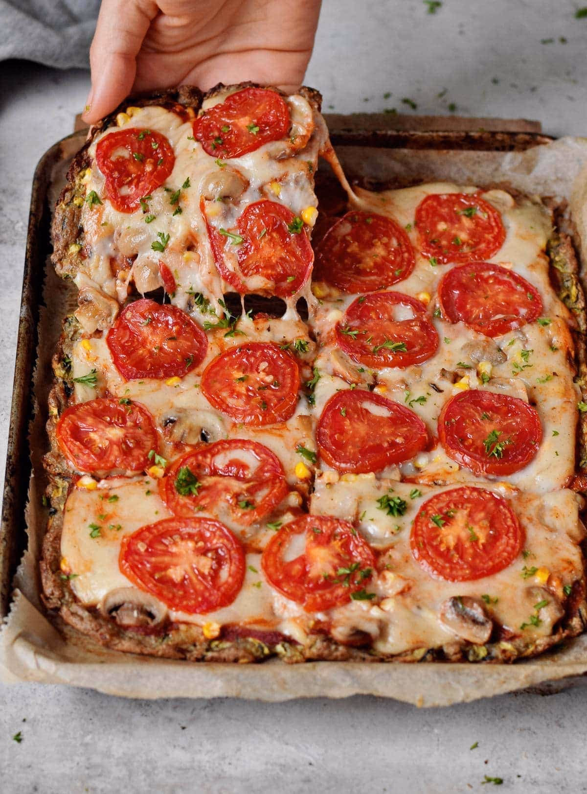 How do you make a zucchini pizza crust?