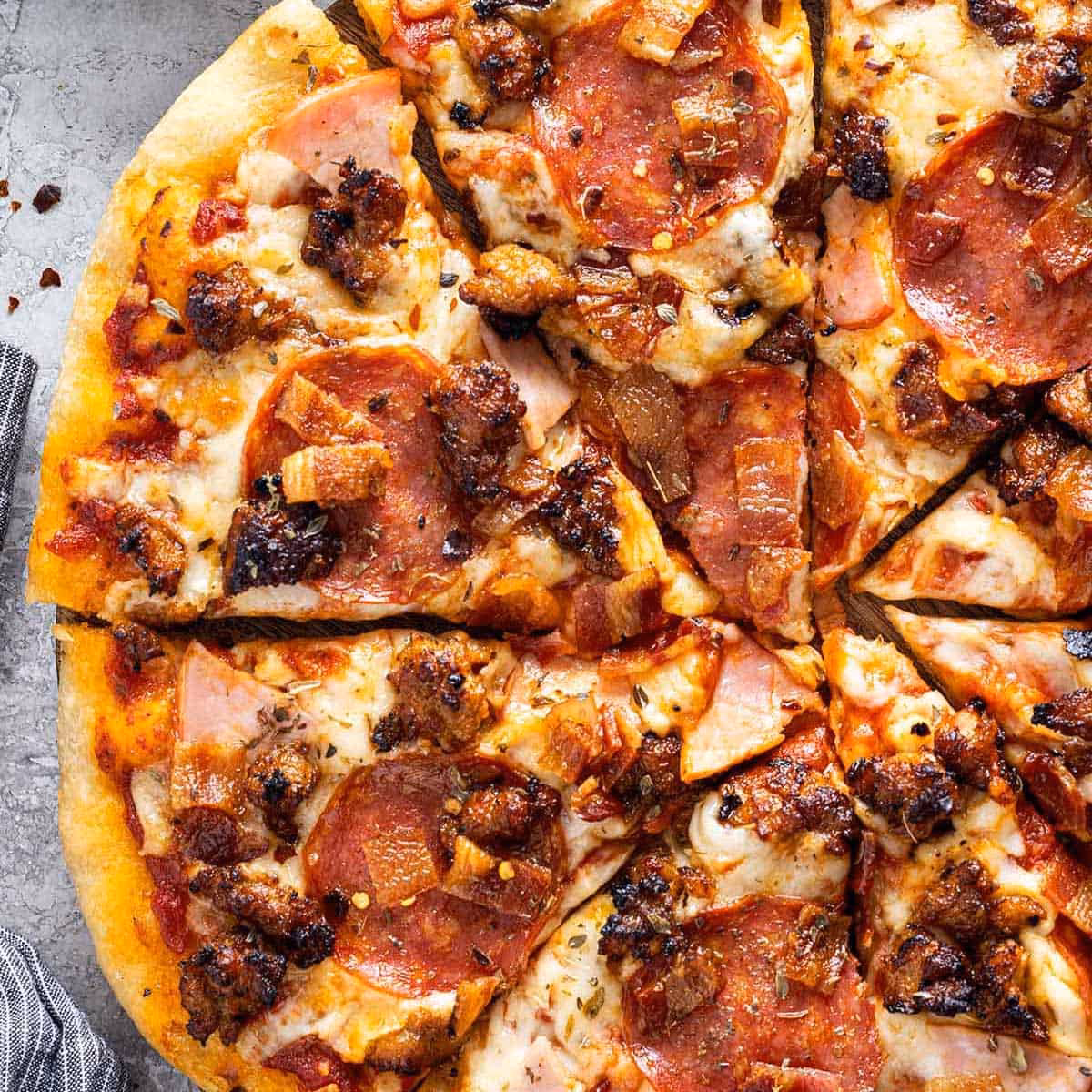 How do you make a meat lover's pizza?