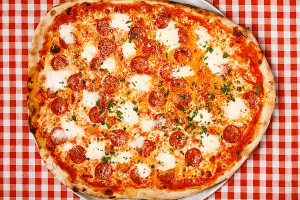 Where is Mikey's pizzeria located?