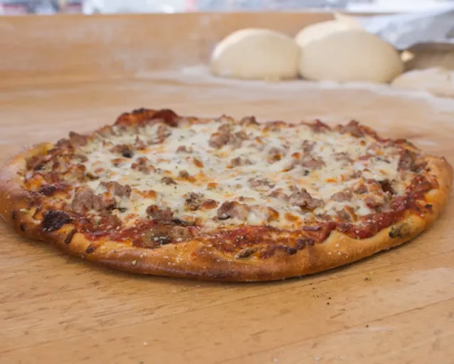 Why is Mimmo's pizza so popular?