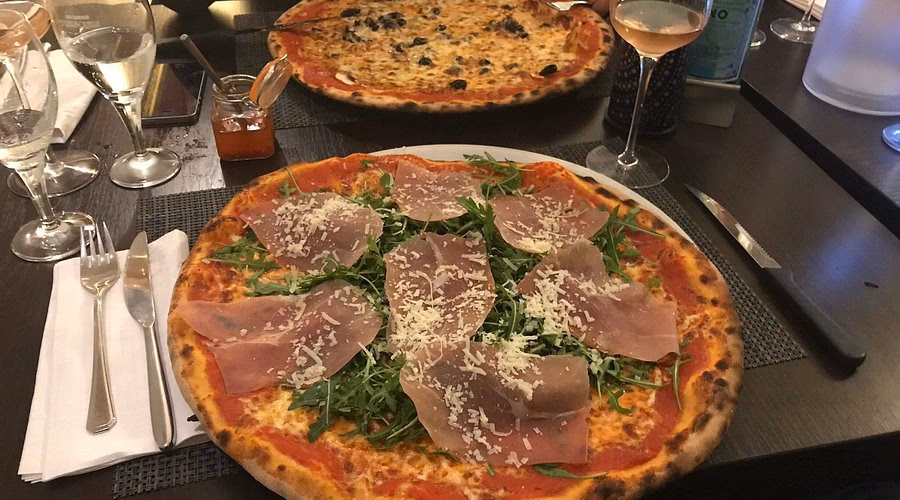Wie viele Gerichte gibt es auf der Speisekarte von Mondo di Pizza?