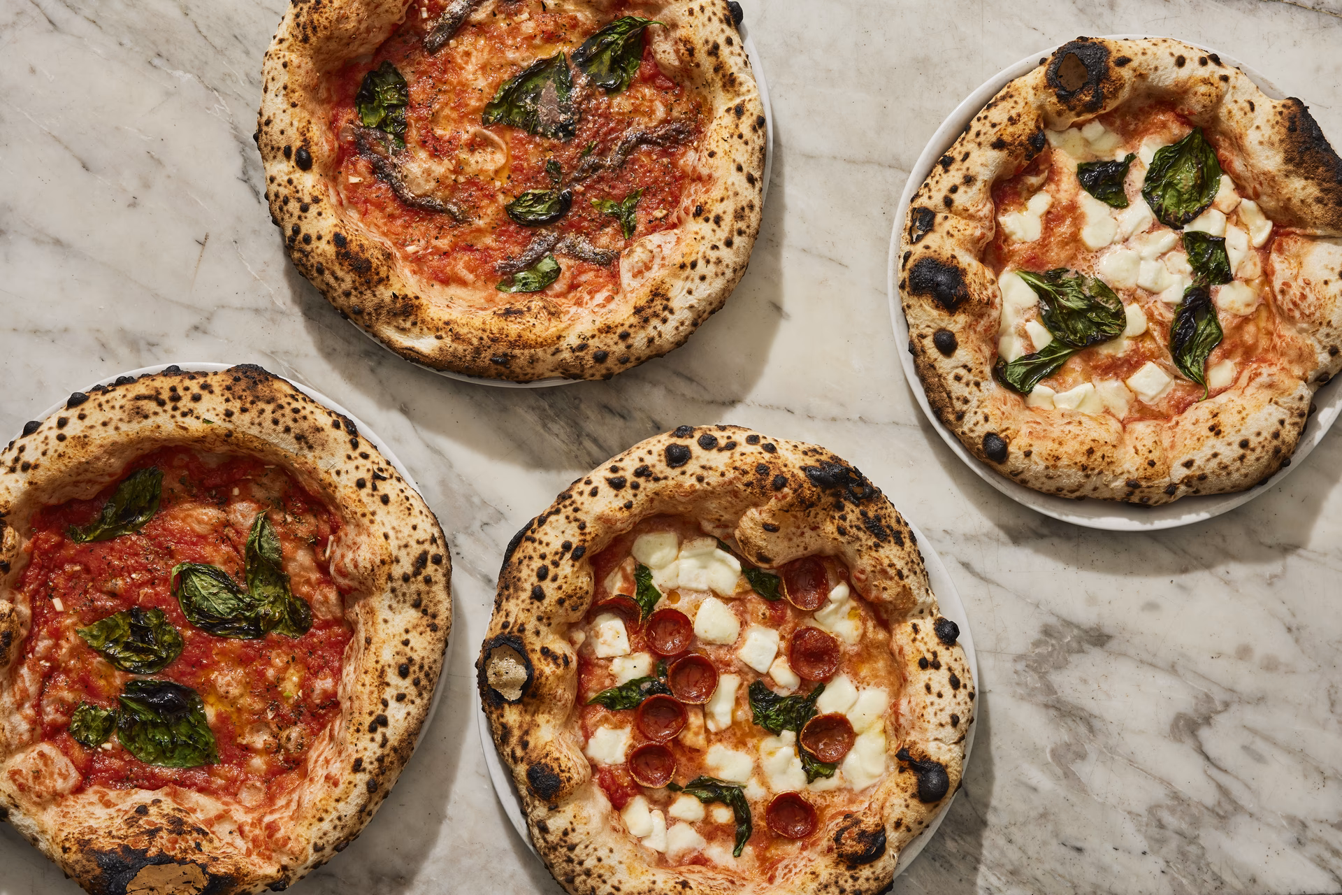 Is Neapolitan pizza the same as New York-style pizza?