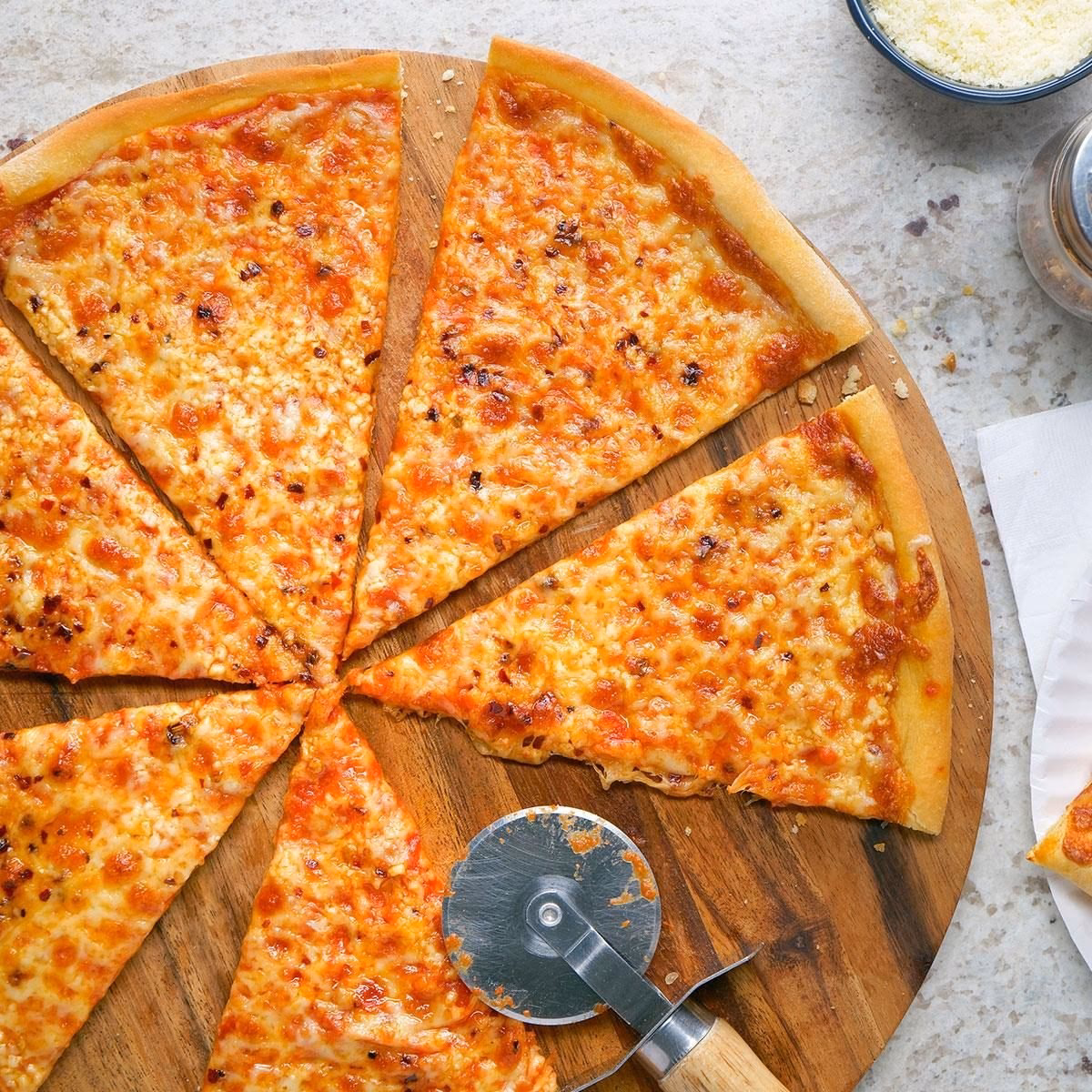 How do you cook New York style pizza?