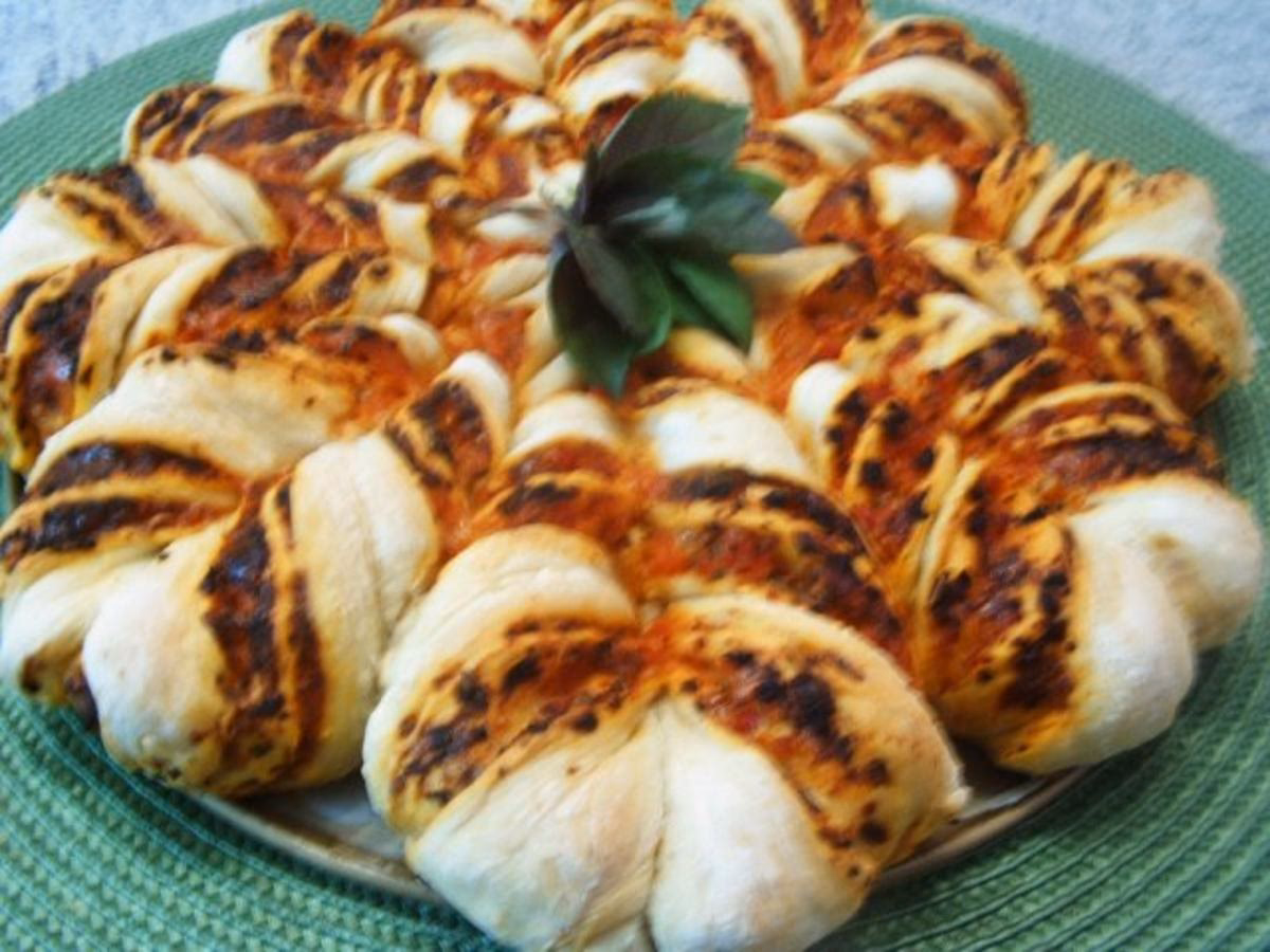 Wie lange muss eine pizzablume im Backofen bleiben?