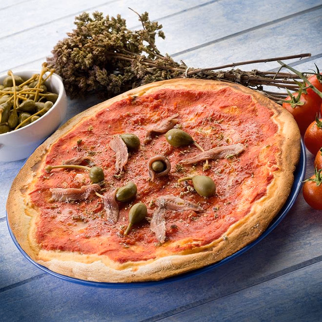 Wie bereite ich eine Pizza Caprese zu?