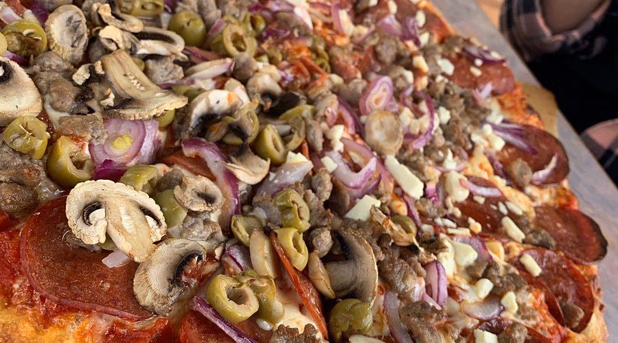 What time does crust pizza co open?