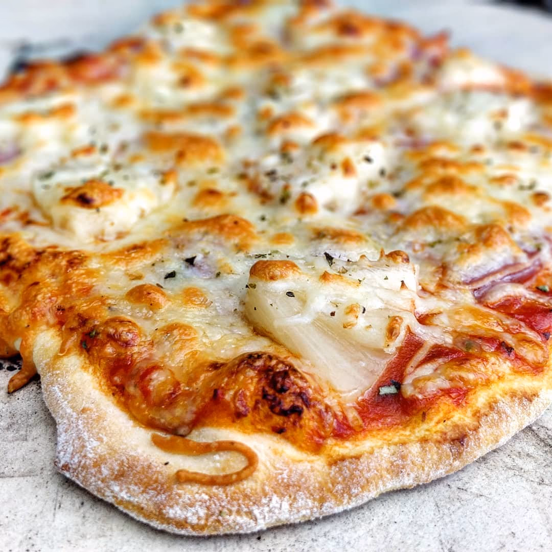 Wie lange dauert es bis eine Pizza auf dem Gasgrill fertig ist?