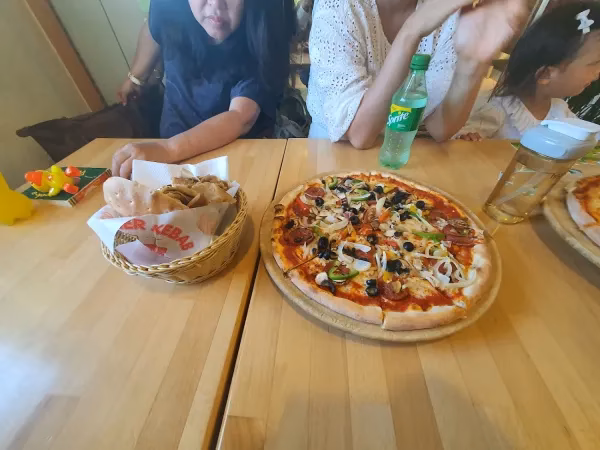 Was macht das Trattoria Giardino Kirchberg so besonders?