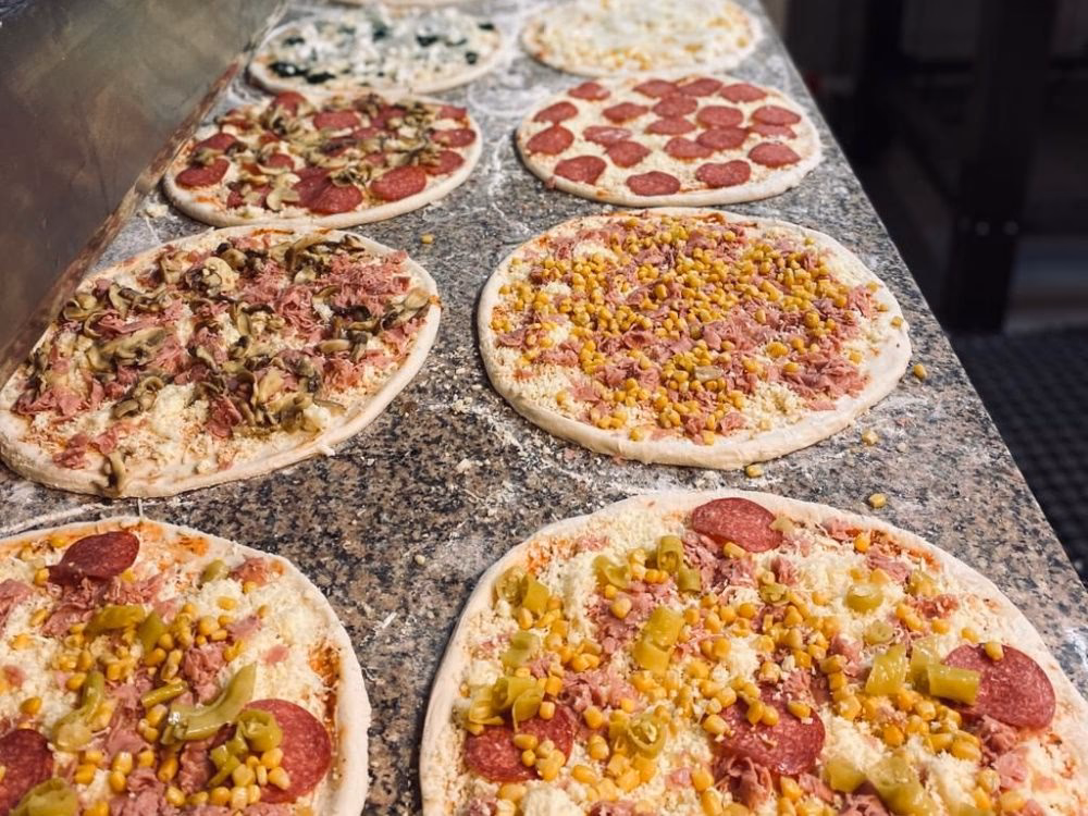 Wie wird Pizza zubereitet?