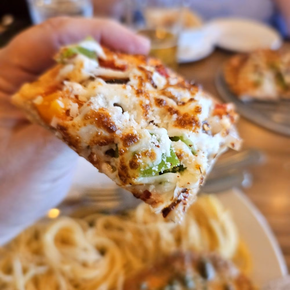 How do I find a pizza places open at 10am?