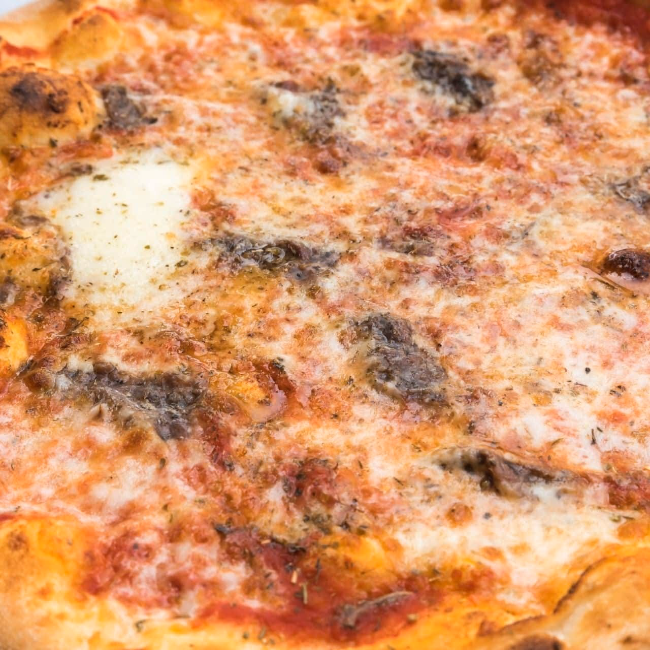 Wie macht man eine römische Pizza?