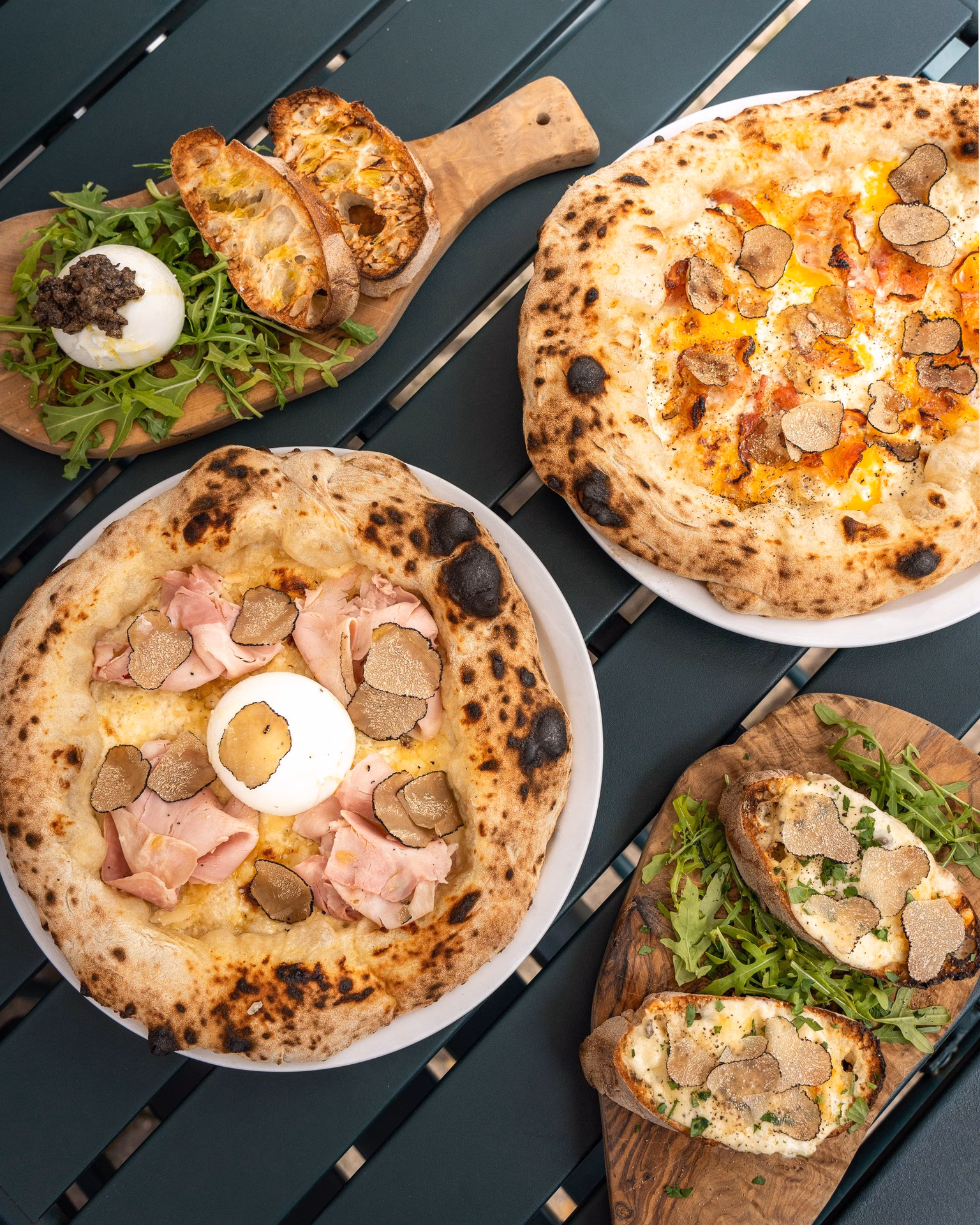 Was bietet die Pizzeria Trattoria?