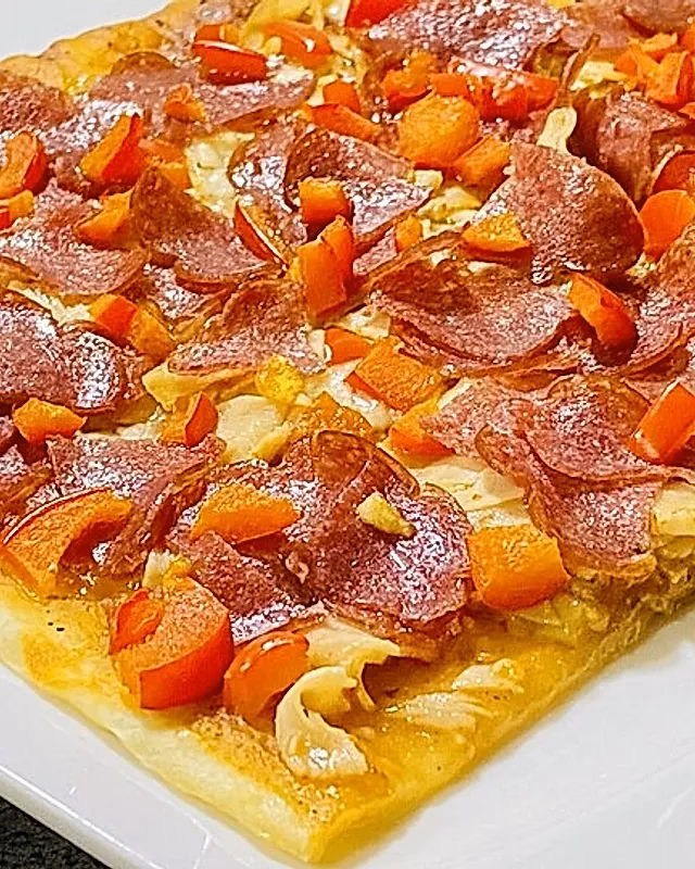 Wie macht man eine Pizza?