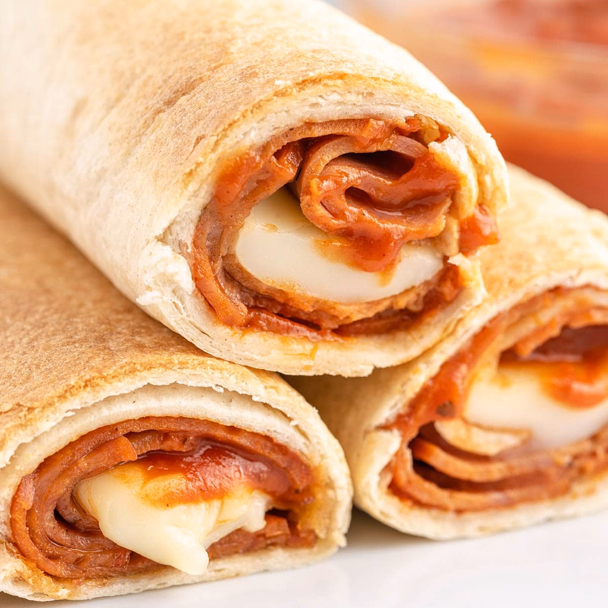 What is a cheesy pepperoni pizza roll-up?