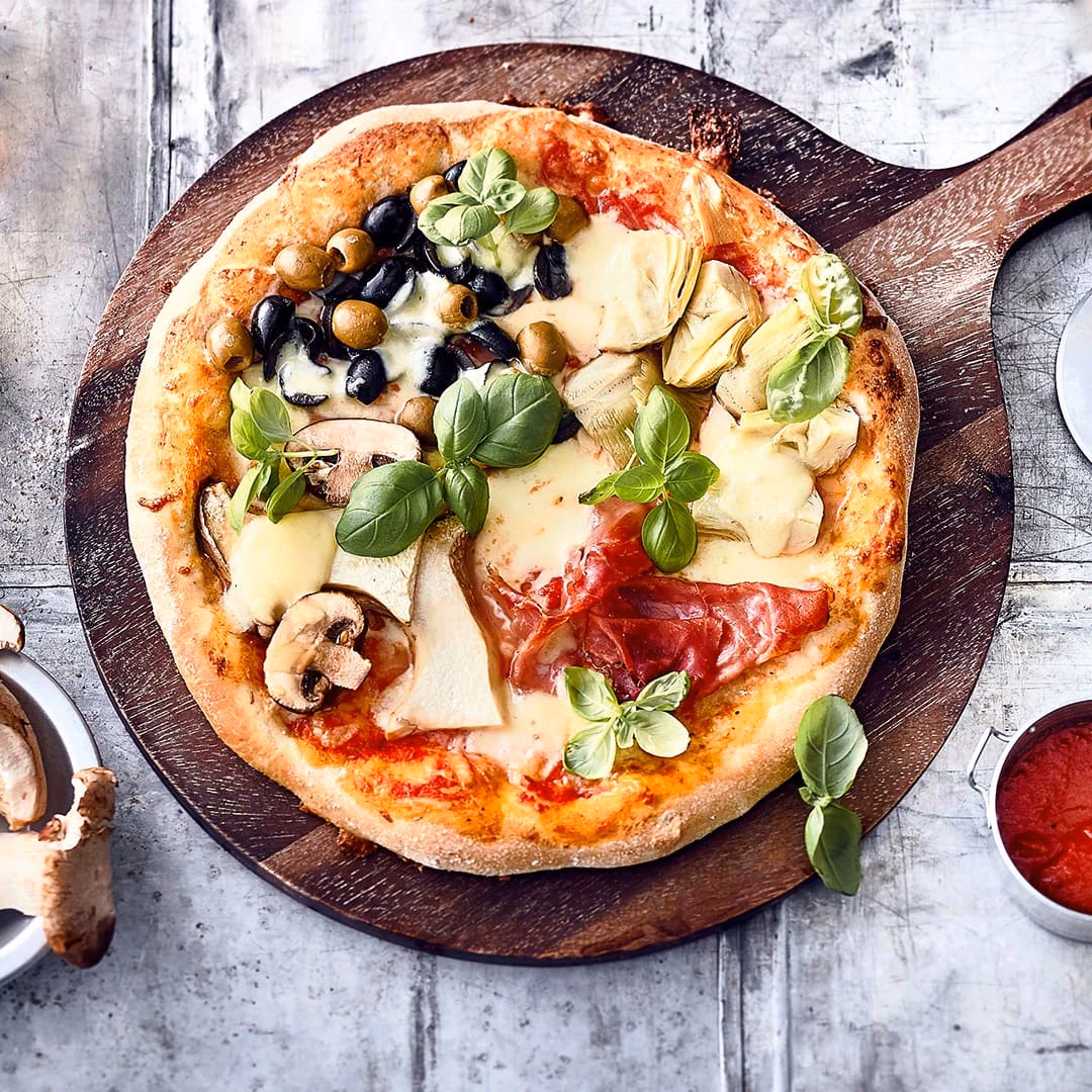 Was ist in der Pizza 4 Jahreszeiten drin?