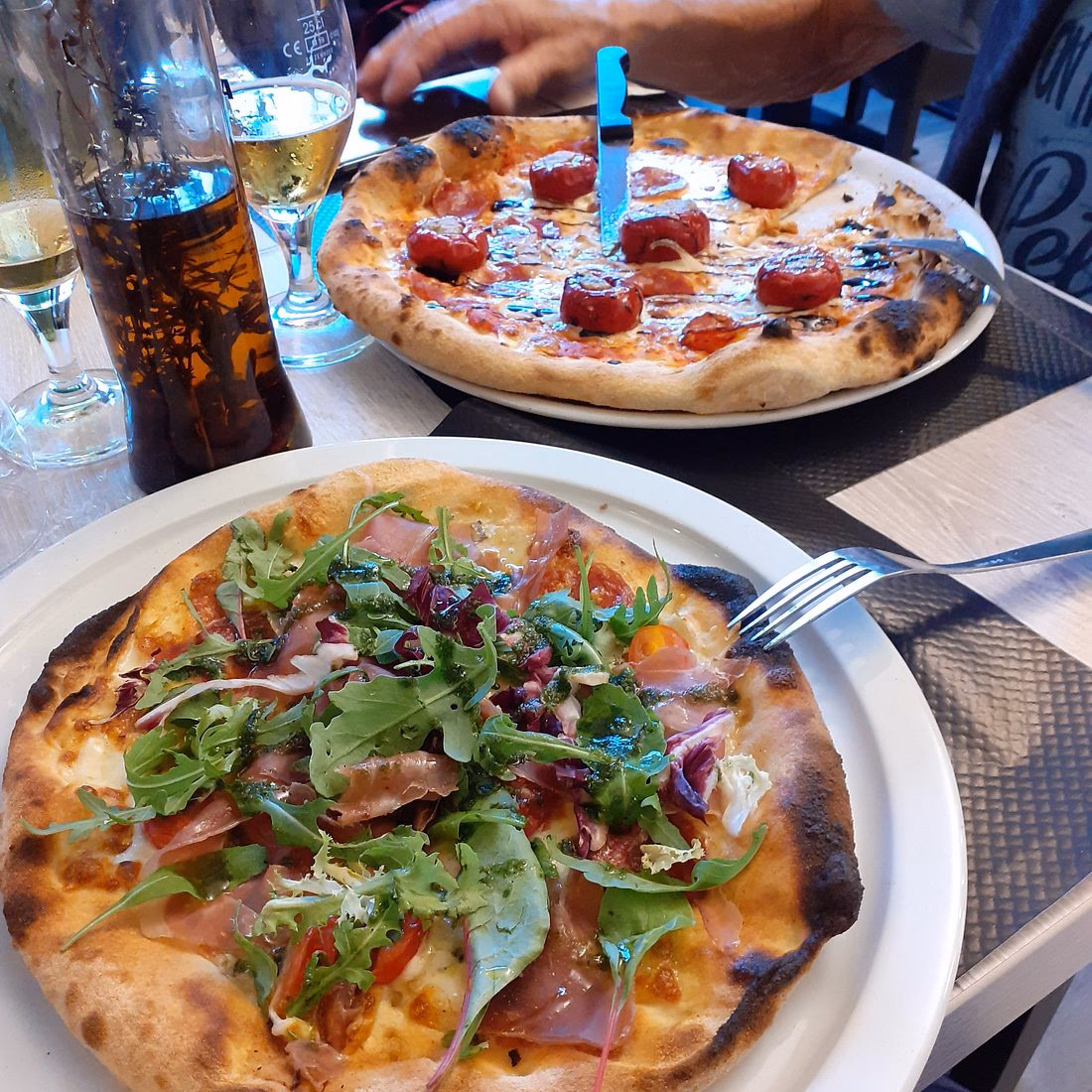 Quelle est la spécialité de la pizzeria di Parma ?