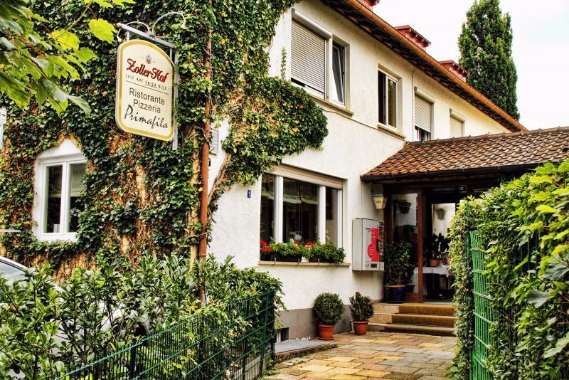 Wann wurde Reutlingen durch eine Stadtmauer befestigt?