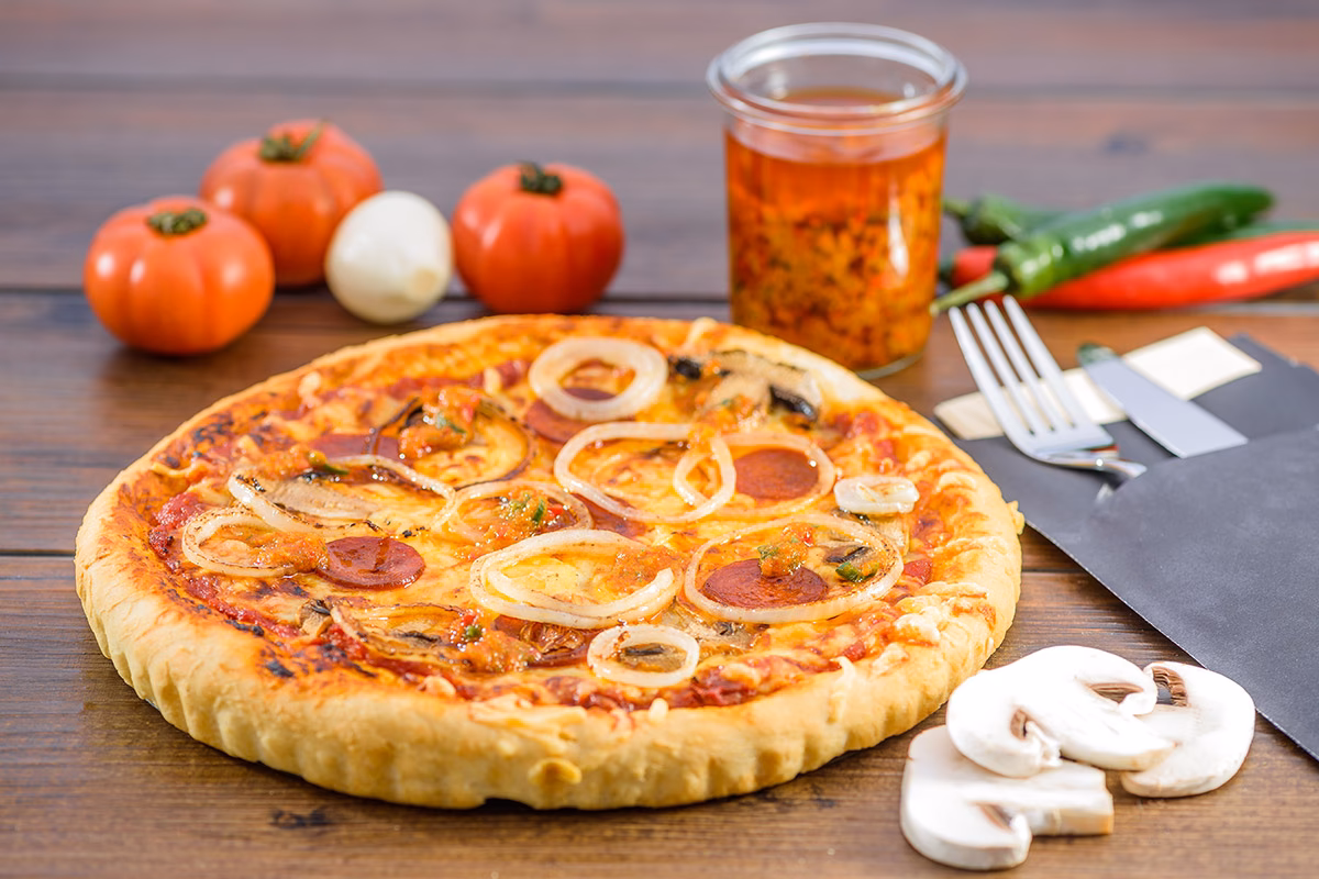 Wie lange muss man Pizza mit Zwiebeln Backen?