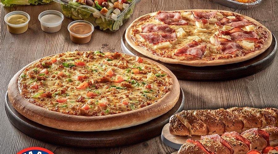 Is Roman pizza the same as pizza al taglio?