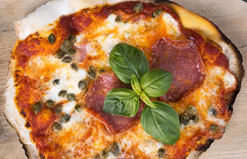 Wie bekomme ich Pizza aus dem Ofen?