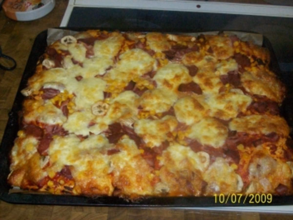 Was muss ich beim Belegen einer Pizza beachten?