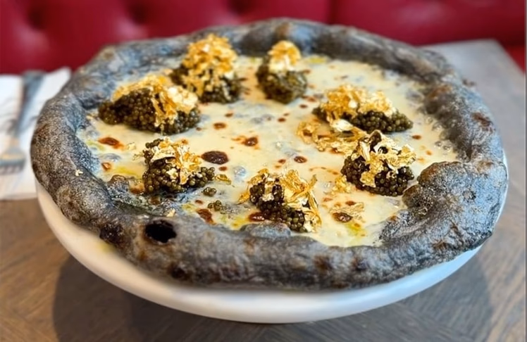 Wie viel kostet eine Spezial-Pizza?