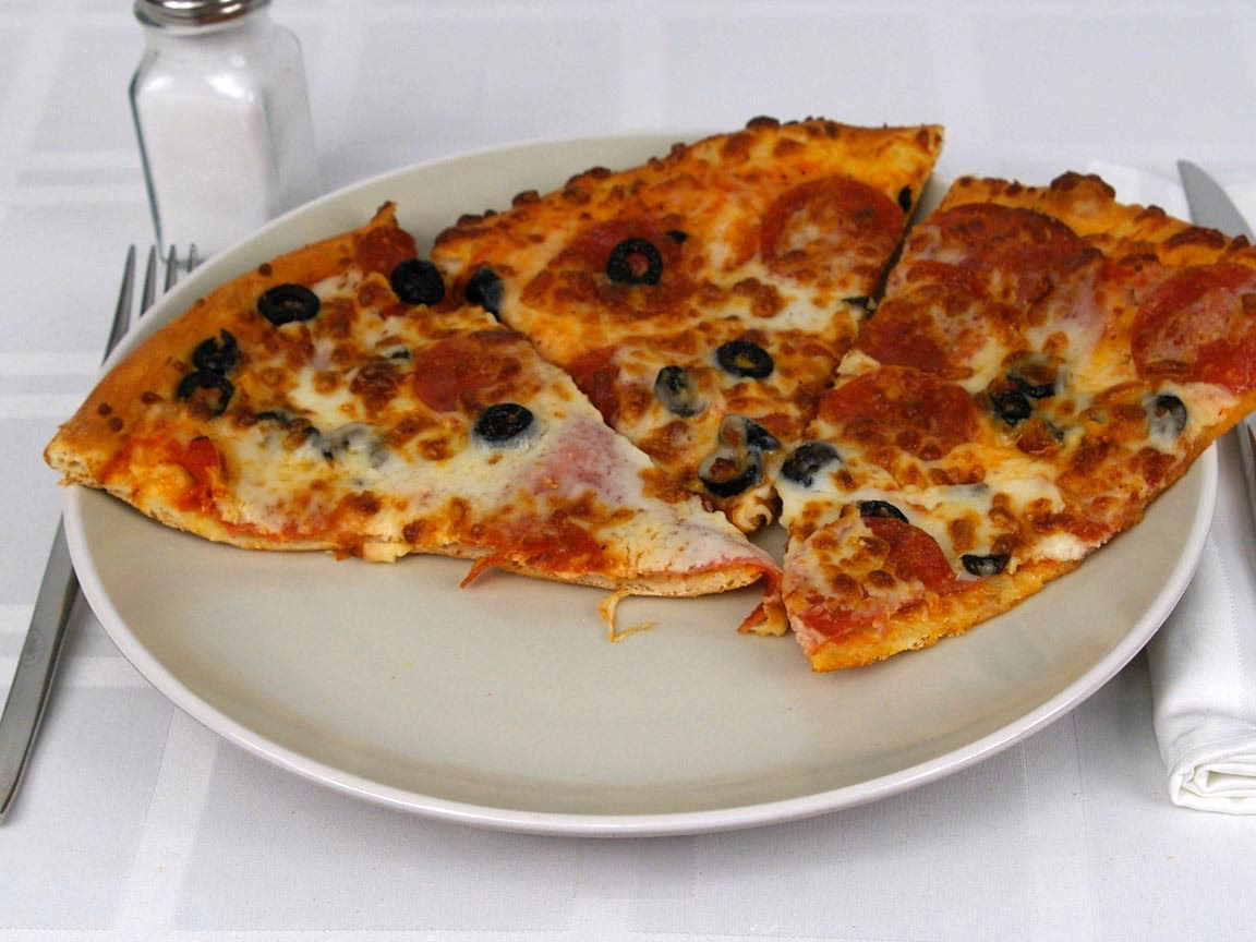 How many calories are in a 14 inch pizza?