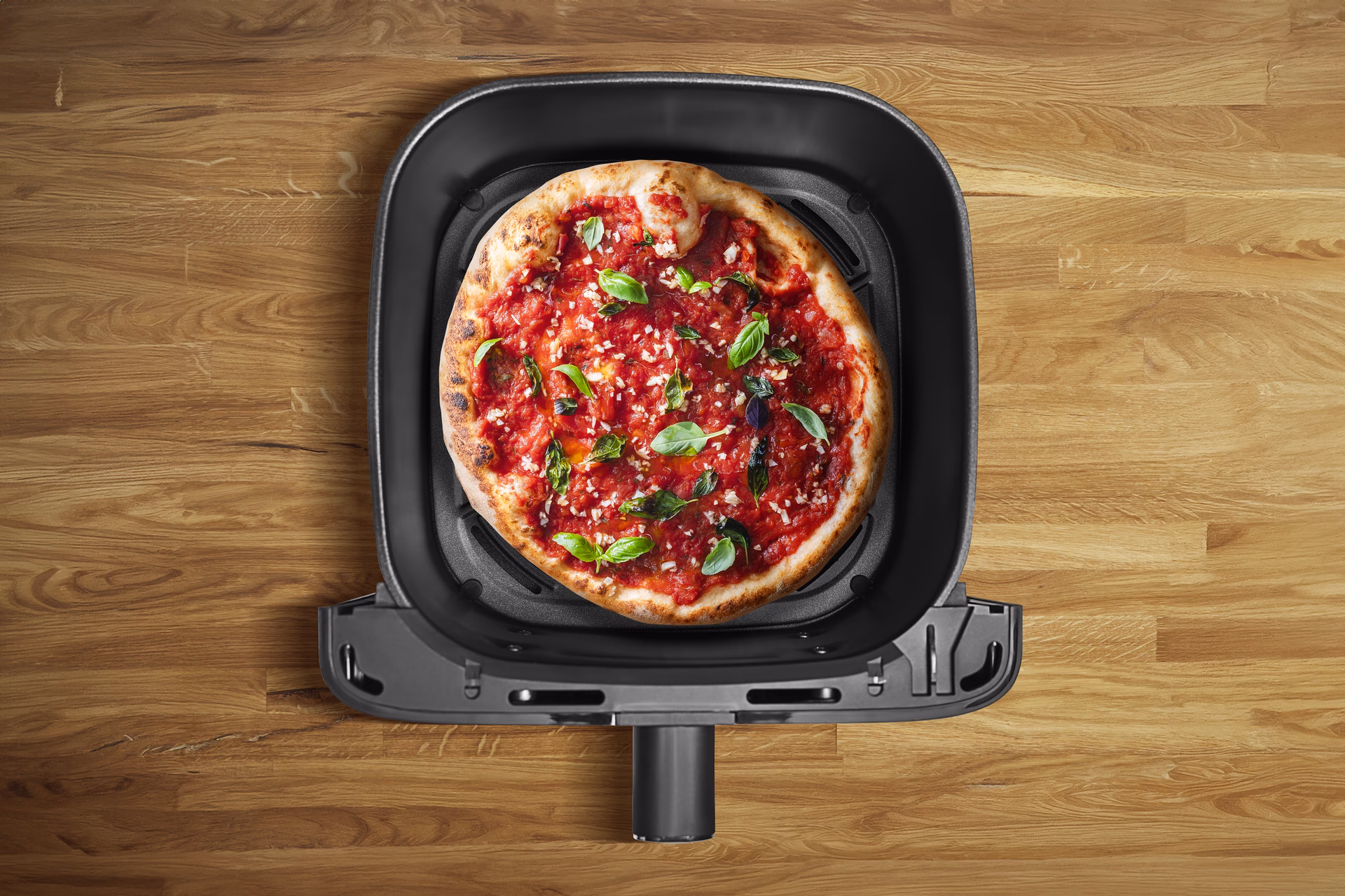 Wie lange muss eine TK-Pizza in den Ofen?