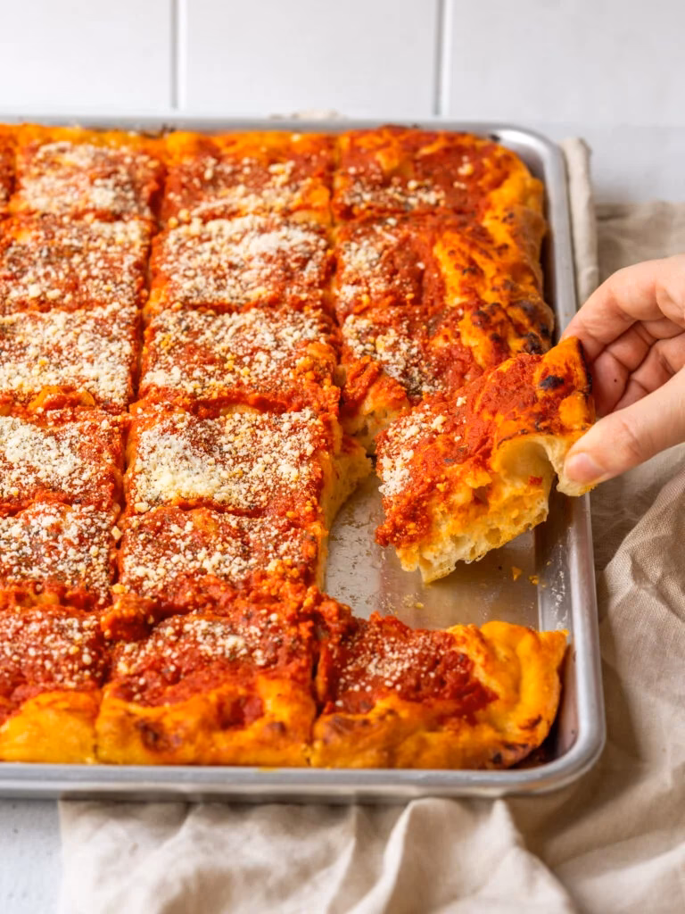 What is the difference between a pizza and a tomato pie?