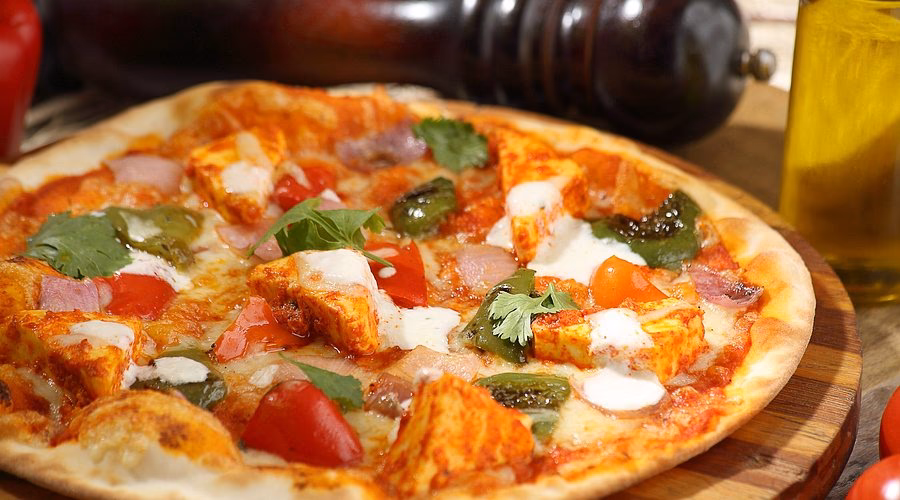 How do you make a Tuscan pizza?