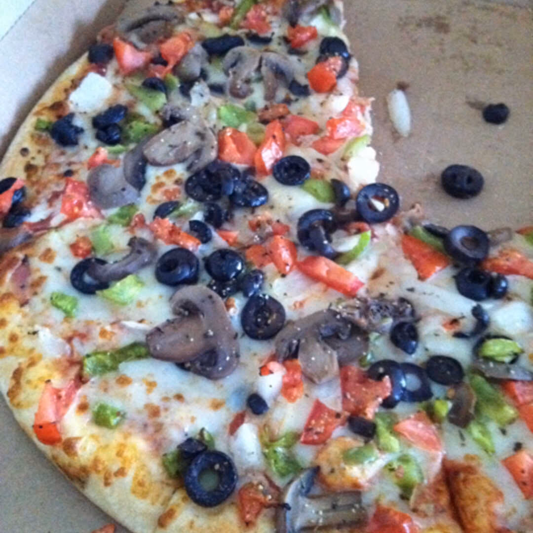 How many calories are in a slice of Veggie Pizza?