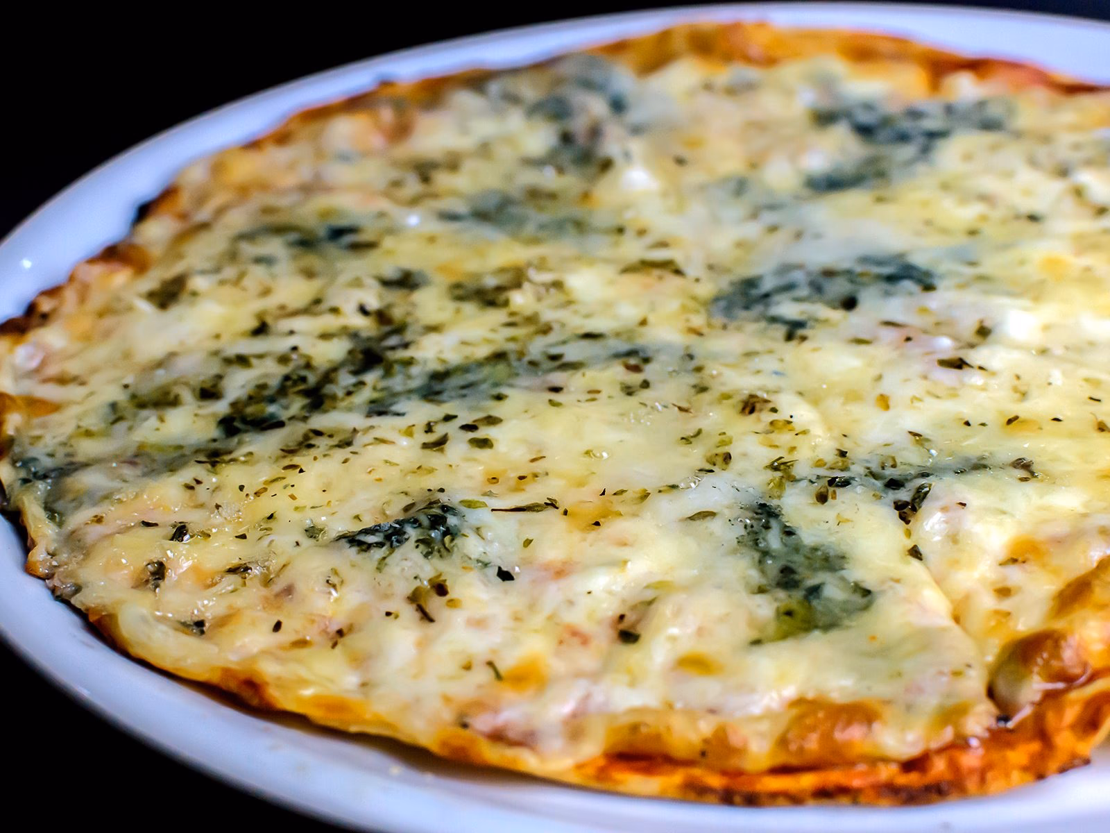 Wie lange dauert eine Vier-Käse-Pizza?