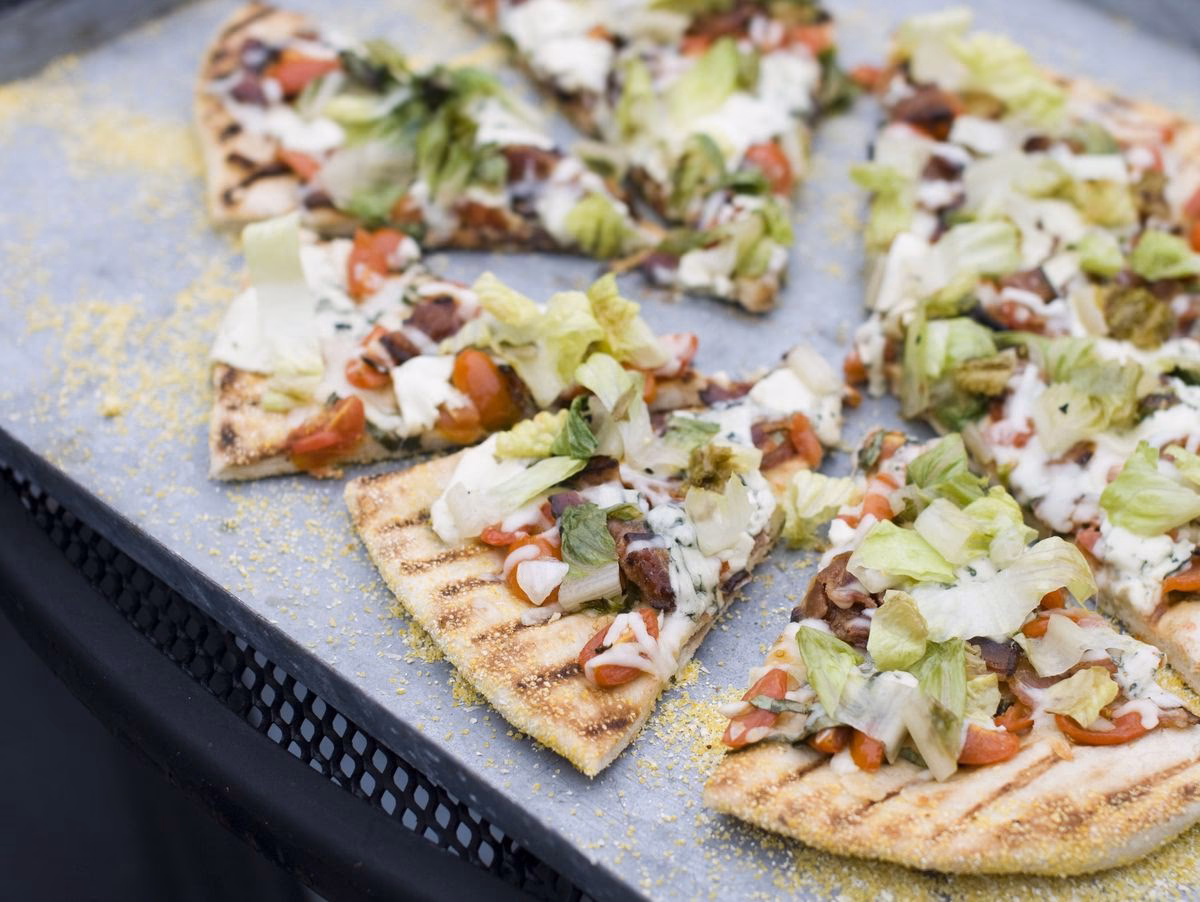 Wie viel wiegt eine Pizza?